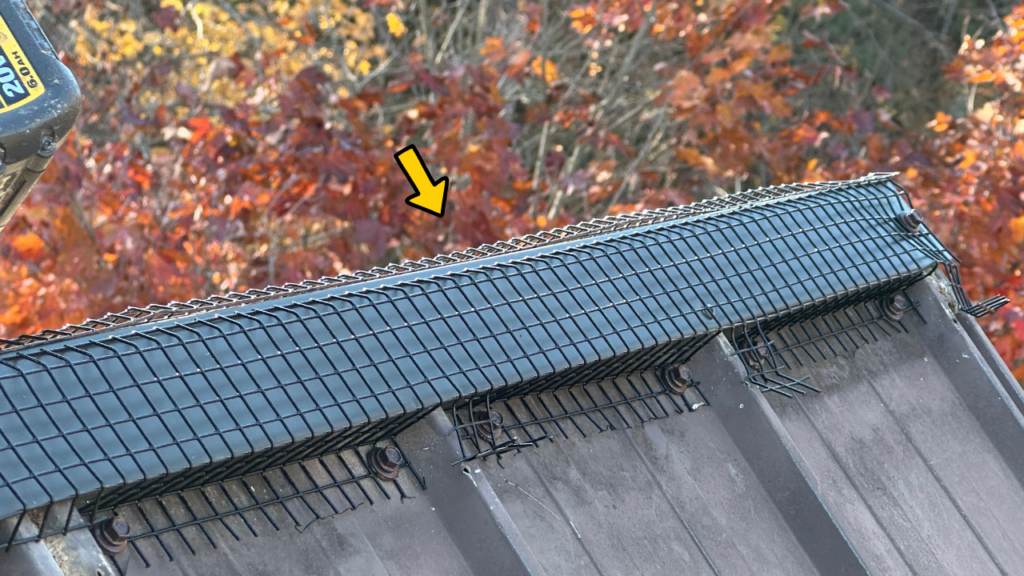 Bat proof screens and reinforcing flashings installed over ridge vent of sharbot lake ontario home. - [ ] By Bat Control Specialists Canadas No1 bat control and bat removal company.
