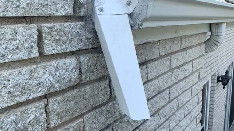 Aluminum bat excluder installed on a Collingwood Ontario home by Bat Control Specialists
