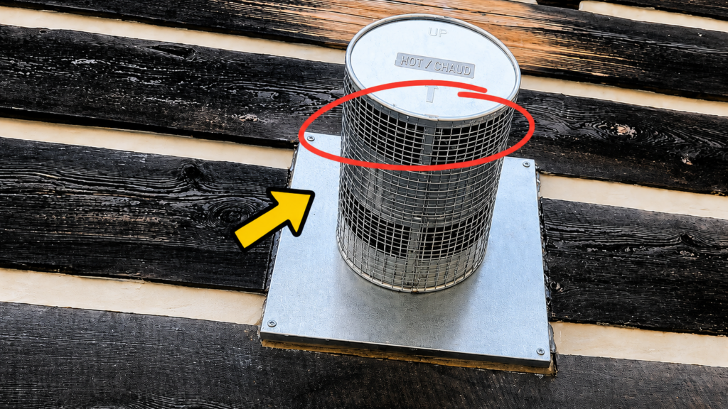 Gas fireplace vent protected with custom half-inch screening to prevent bats from entering or roosting inside the vent assembly.