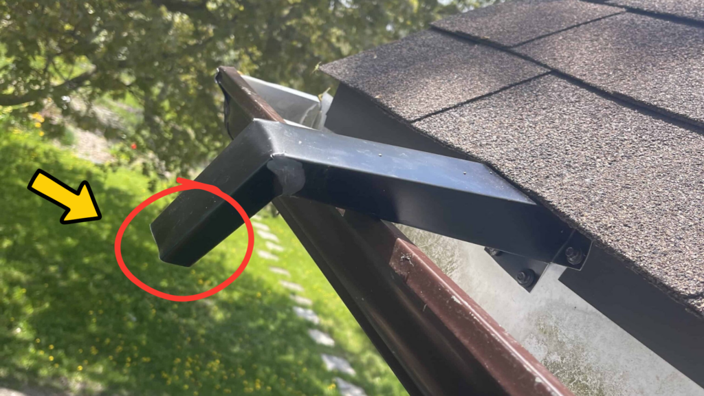 Custom bat excluder installed over a roof edge opening to let bats exit safely but prevent re-entry