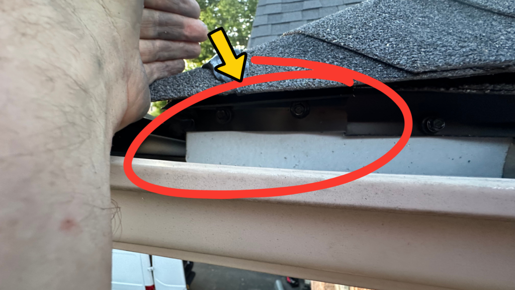 Custom drip edge piece installed at roof corner to close bat entry gap