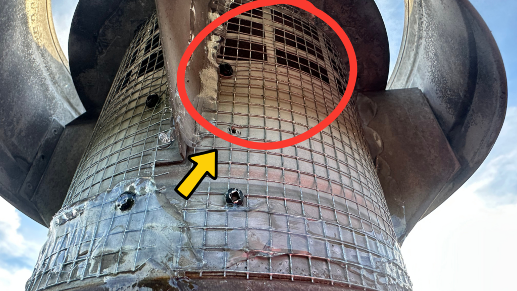 Quarter-inch mesh screen installed on B-vent chimney cap to keep bats out of the metal vent