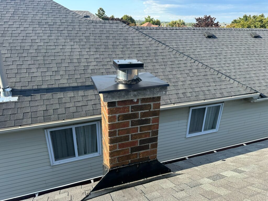 Repaired chimney cap sealed to keep bats and other animals out of an Ontario home