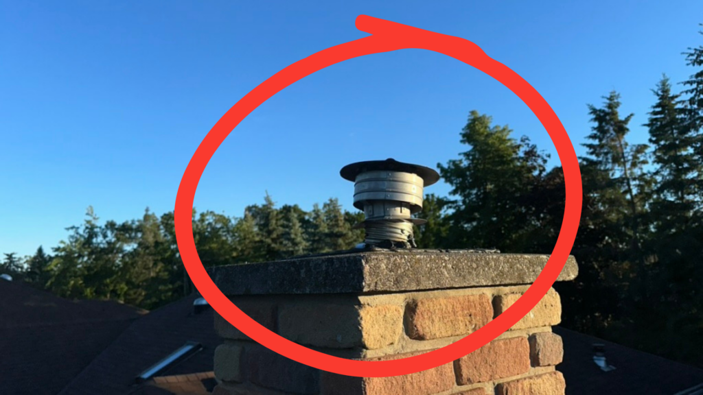Completed gas-liner chimney cap and flashing after bat-proofing on a Bobcaygeon home